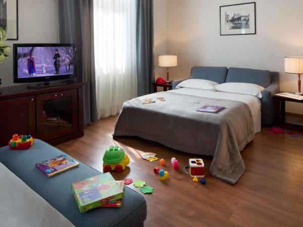 Starhotels Excelsior : photo 2 de la chambre chambre familiale (2 adultes et 2 enfants)