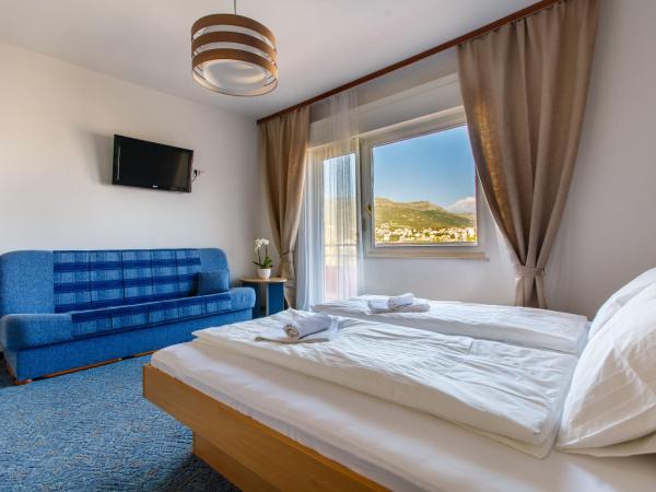 Rooms Split : photo 9 de la chambre chambre double ou lits jumeaux deluxe - vue sur mer