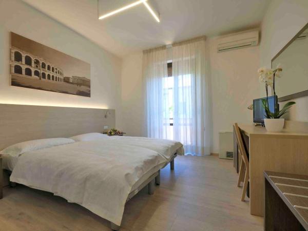 Hotel Gelmini : photo 1 de la chambre chambre double ou lits jumeaux