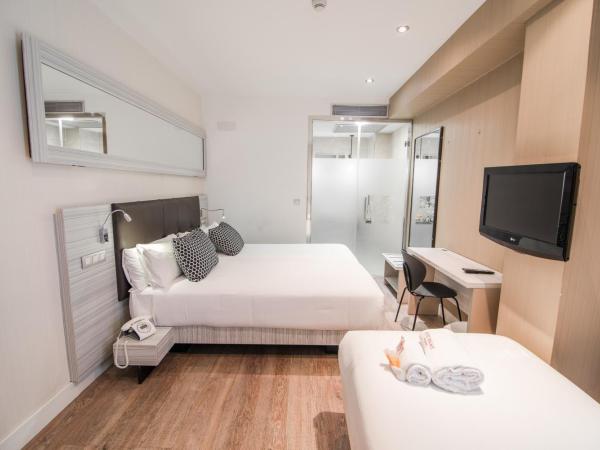 Petit Palace Puerta del Sol : photo 5 de la chambre chambre triple