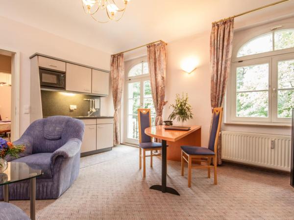 Aparthotel Villa Freisleben : photo 9 de la chambre suite avec balcon