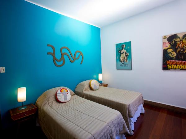 Casa Beleza : photo 1 de la chambre chambre double ou lits jumeaux - vue sur jardin