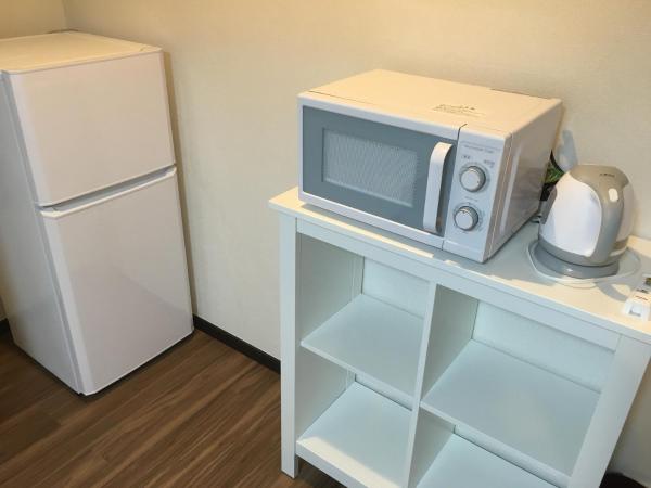 TIMES INN 2F : photo 8 de la chambre chambre double avec salle de bains commune