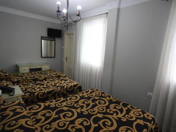 Hostal Roma : photo 4 de la chambre chambre triple