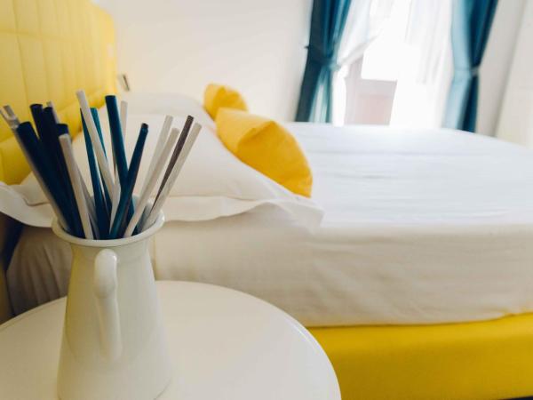 Etna Suite Group : photo 1 de la chambre chambre triple avec balcon