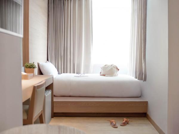Kritthai Residence : photo 3 de la chambre chambre triple de luxe