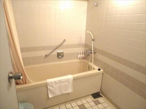 Green Rich Hotel Nishitetsu Ohashi Ekimae : photo 1 de la chambre chambre triple - non-fumeurs