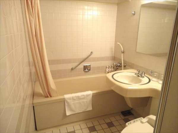 Green Rich Hotel Nishitetsu Ohashi Ekimae : photo 2 de la chambre chambre lits jumeaux de luxe - non-fumeurs