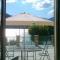 Panoramic Terrace steps from the Lake Iseo in Spacious Apartment-0