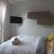 Michelangelo Apartments con parcheggio gratuito in loco e self check in-6