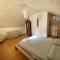 Comfortable House with Fenced Garden - Surano - Fireplace-53