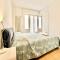 Hostdomus - White and Sea Suite-10