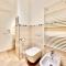 Hostdomus - White and Sea Suite-19