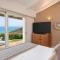 Deluxe Zimmer mit Kingsize-Bett mit Meerblick