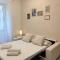 2BR Flat by Metro - 6min to Colosseo - Full Kitchen - Wi-Fi - A-C-27