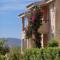 Village in Porto Corallo just 200 meters from the beach, apartments with private outdoor area-0