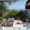 Villa Anna - Mansarda vista mare con giardino e patio