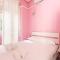 GuestHost - Isola Cosy Pink Studio Apt-1