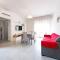 GuestHost - Lovely Flat - Steps from the Sea!