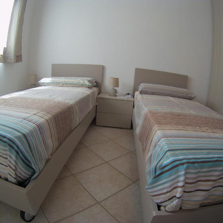 Condominio Le Palme - Appartamento con 2 Camere da Letto - 32