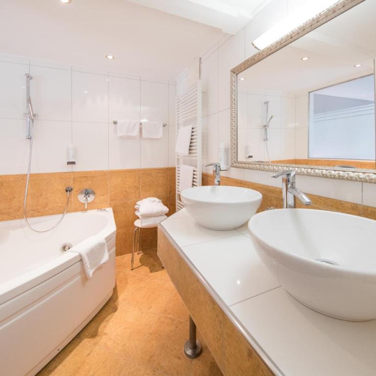 HEITZMANN - Hotel & Rooftop - Deluxe Doppelzimmer mit Whirlpool - 3