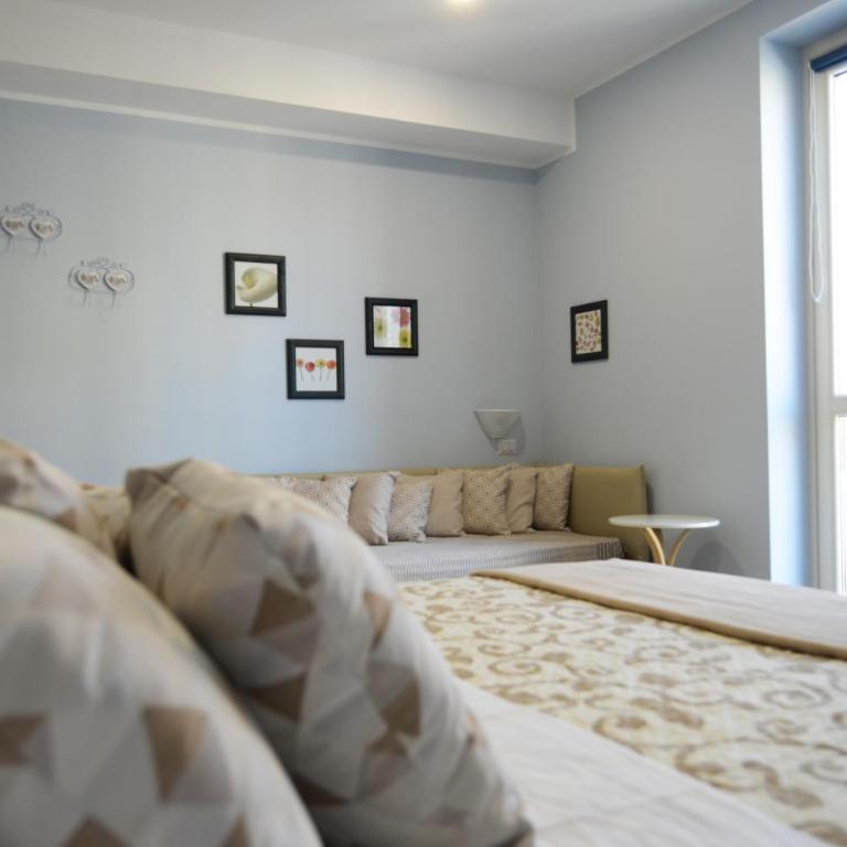 Hotel Giulio Cesare - Comfort Quadruple Room - 1
