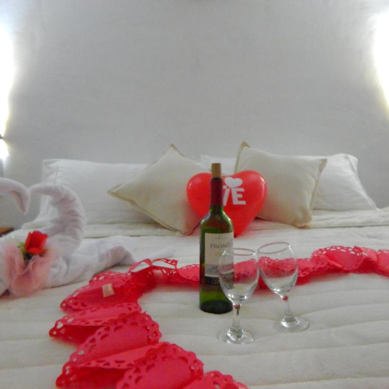 Entre Sombreros - Habitación con cama grande y vistas al jardín - 8