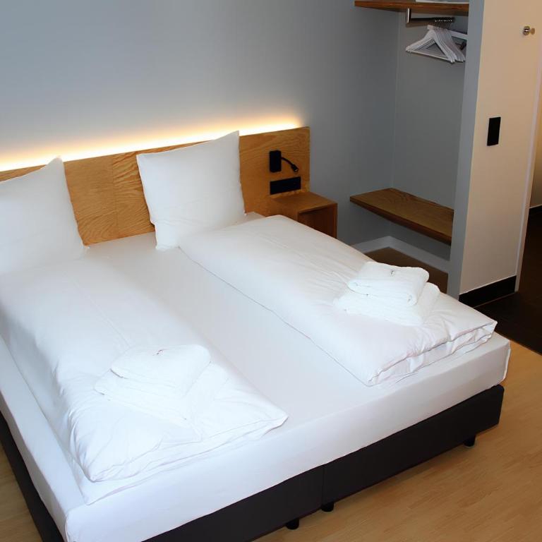 mk | hotel münchen city - Zimmer mit Kingsize-Bett - 5