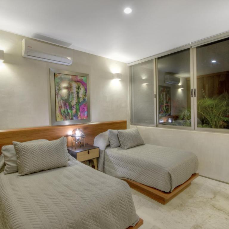 Eco-chic Design Condos Wrapped in Nature's Elements by Stella Rentals - Apartamento con balcón - 4