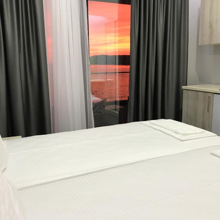 Guesthouse Montex - Deluks Soba sa Bračnim Krevetom/Zasebnim Krevetima i Pogledom na More - 12