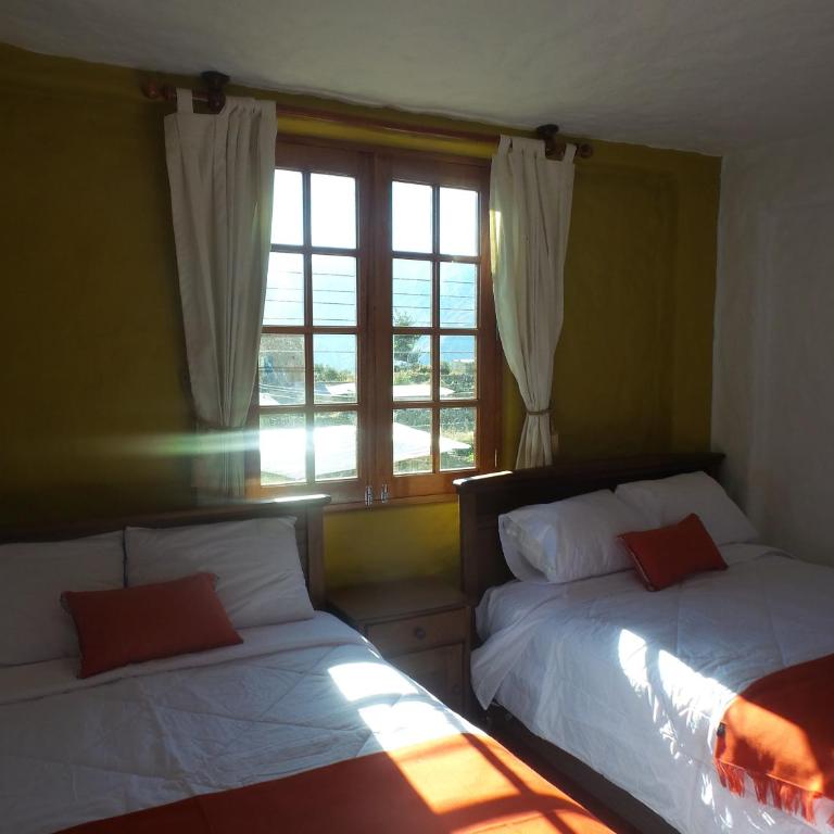 La Casa de Santiago Hotel - Deluxe Queen Room with Two Queen Beds - 9