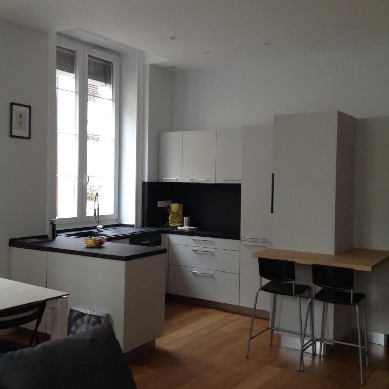 Charme et Modernité au Cœur de Lyon - Appartement 2 Chambres - 4