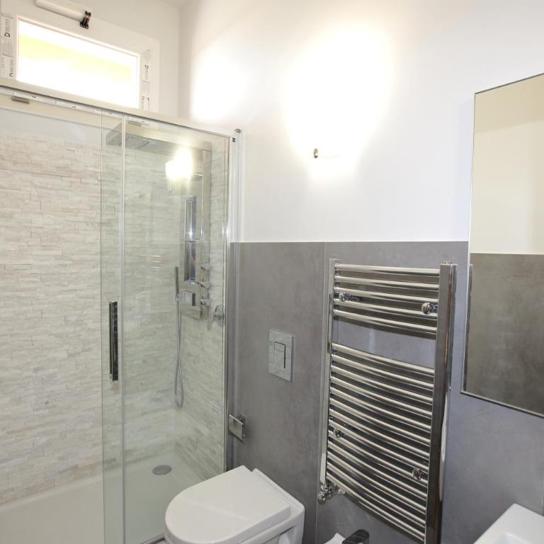 Charme Rooms - Camera Tripla Deluxe con Vista Mare - 1