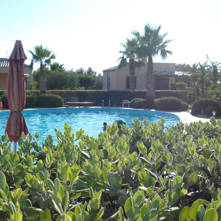 Casa Vacanze Libeccio - Villetta con giardino e piscina condominiale - Casa Vacanze - 38