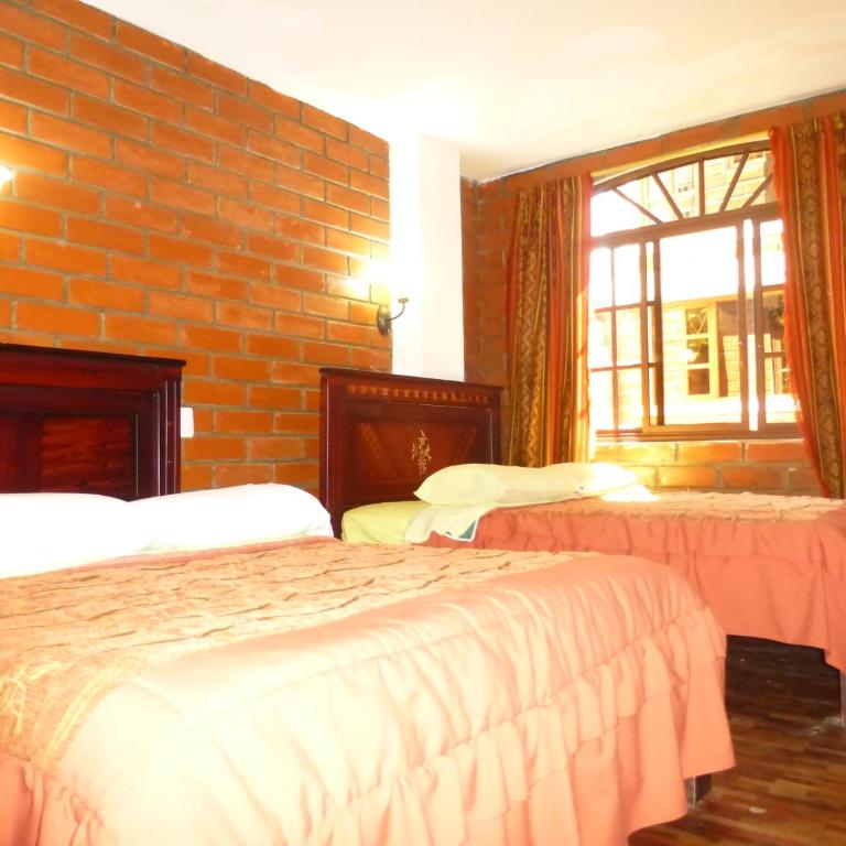 Hostal Nomada - Habitación cuádruple - 8