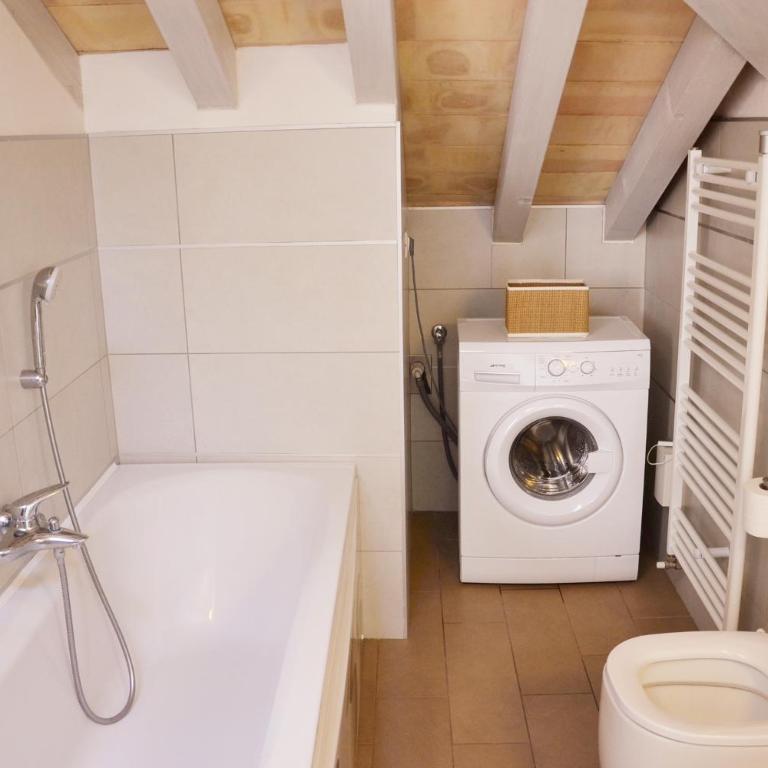 Niki O. Apartments - One-Bedroom Apartment - Split Level - Via Ferdinando Maestri 13 - 14