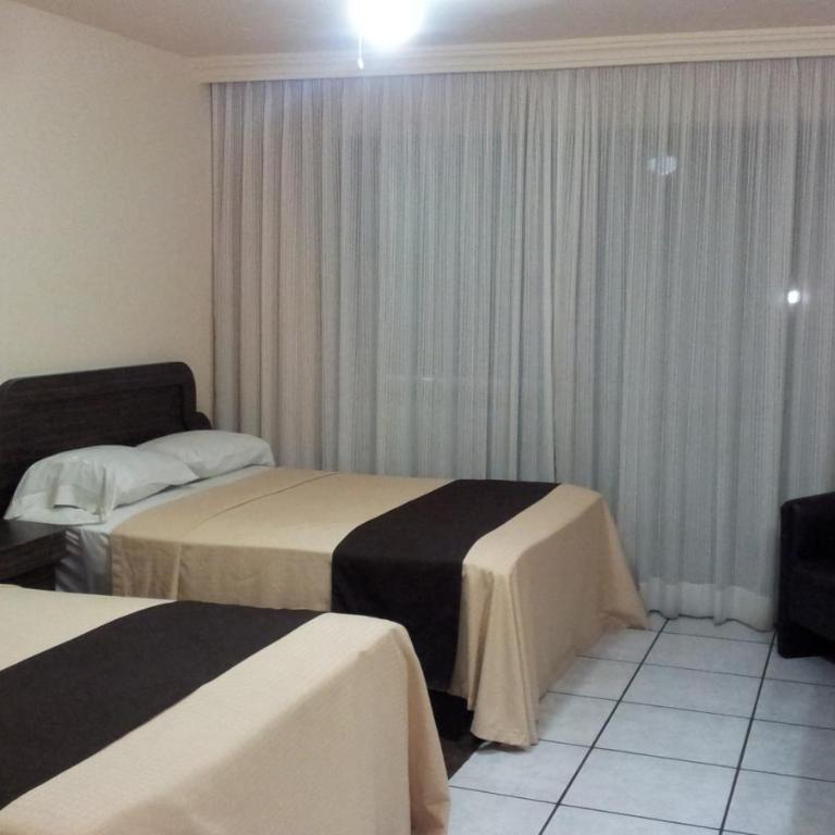 Hotel Real del Sol - Habitación Doble - 2 camas dobles - 8