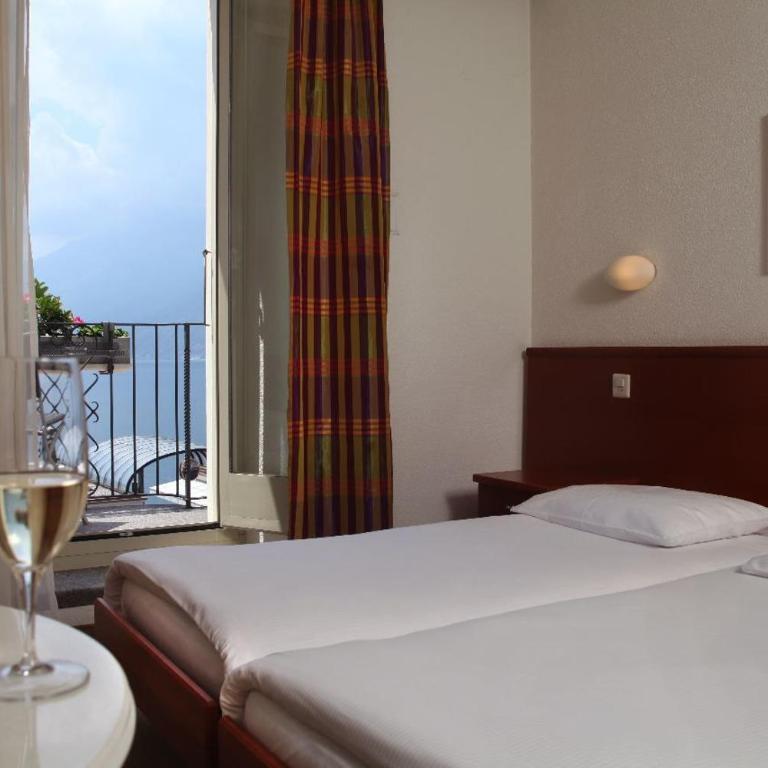 Piazza Ascona Hotel & Restaurants - Camera Doppia con Letti Singoli con Balcone e Vista Lago - 1