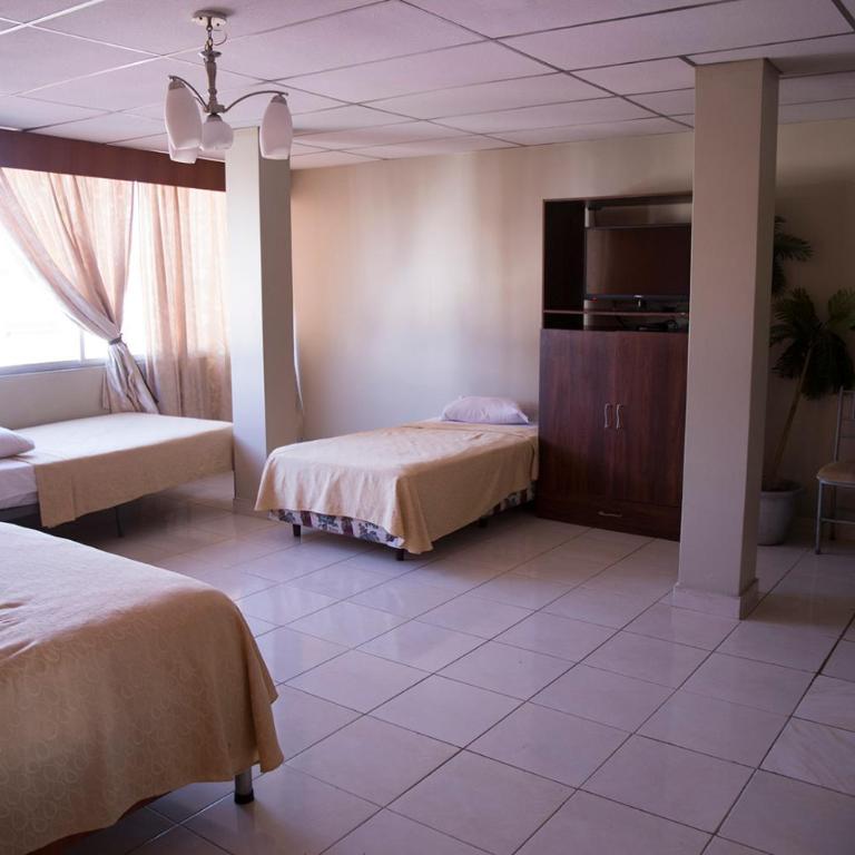 Tropical Inn Hotel - Habitación cuádruple - 1