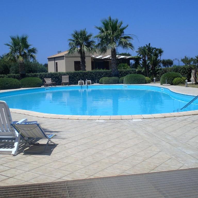 Casa Vacanze Libeccio - Villetta con giardino e piscina condominiale - Casa Vacanze - 1
