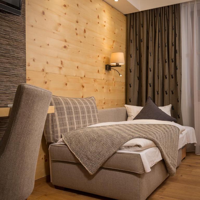 Hotel Weinbauer - Luxus Dreibettzimmer - 1