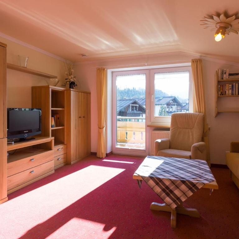 Alpenflair Ferienwohnungen Gästehaus Tepferdt - Apartment mit Gartenblick - 8