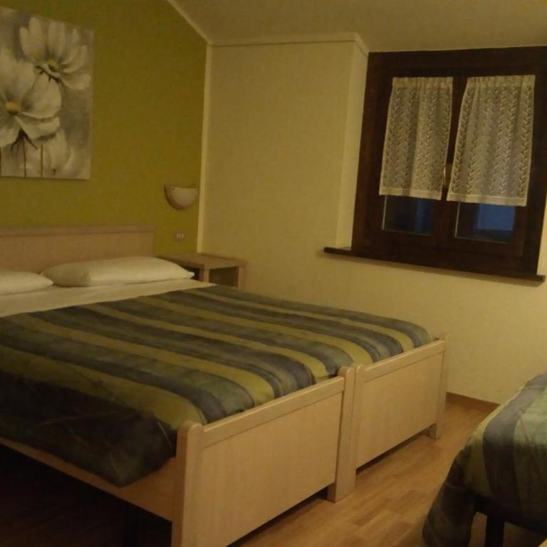 Garni Delia - Chambre Triple - 1