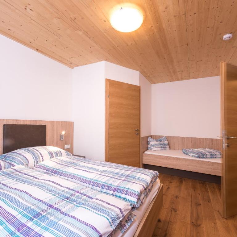 Appartements Sulzer by we rent, SUMMERCARD INCLUDED - Apartment mit 2 Schlafzimmern, einem Balkon und Gartenblick - 5
