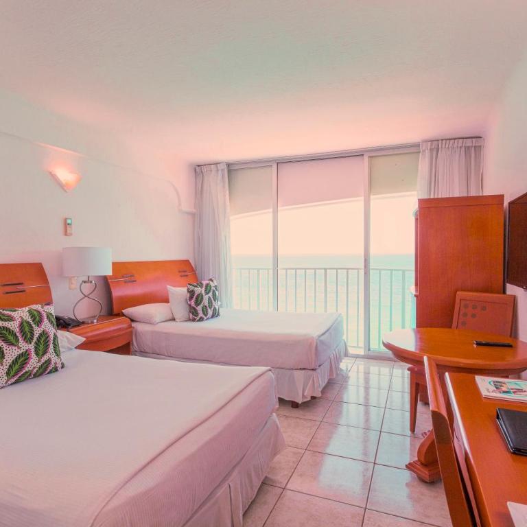 Coral Princess Hotel & Dive Resort - Habitación Doble Deluxe - Frente al océano - 4