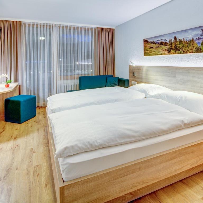 Matterhorn Inn - Wellness & Dining - at Zermatt Shuttle Station - Superior Doppelzimmer - 1