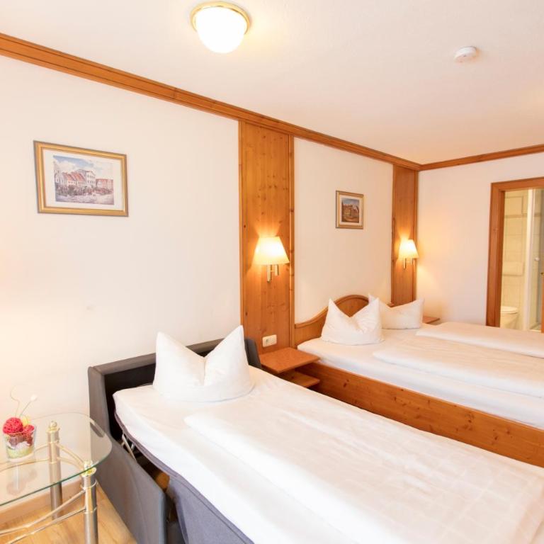 Akzenthaus Alpenrose Nesselwang - Doppelzimmer mit Zustellbett - 1