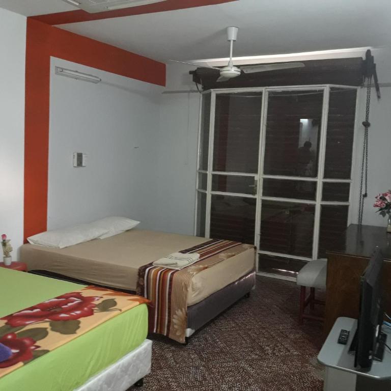 Nueva Alborada Lodging House - Habitación Familiar con baño privado - 3