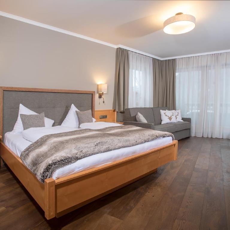 Hotel Christina - Ihr kleinstes 4* Hotel am Achensee - Suite mit Seeblick - 1