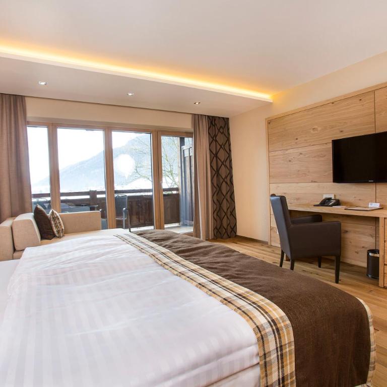 Das gemütliche Dorfhotel Kaltenhauser - Deluxe Doppelzimmer mit Balkon - 8